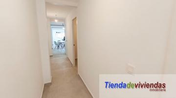 PASILLO Piso en la calle mayor de Vergel completamente reformado. Consta de amplio salón comedor soleado con cocina americana, lavadero, balcón,  3 dormitorios dobles y 2 baños.Gran solarium y trastero. Finca con 3 inmuebles (uno por planta). 